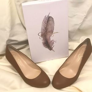 Brown like new women wedges. Worn once.